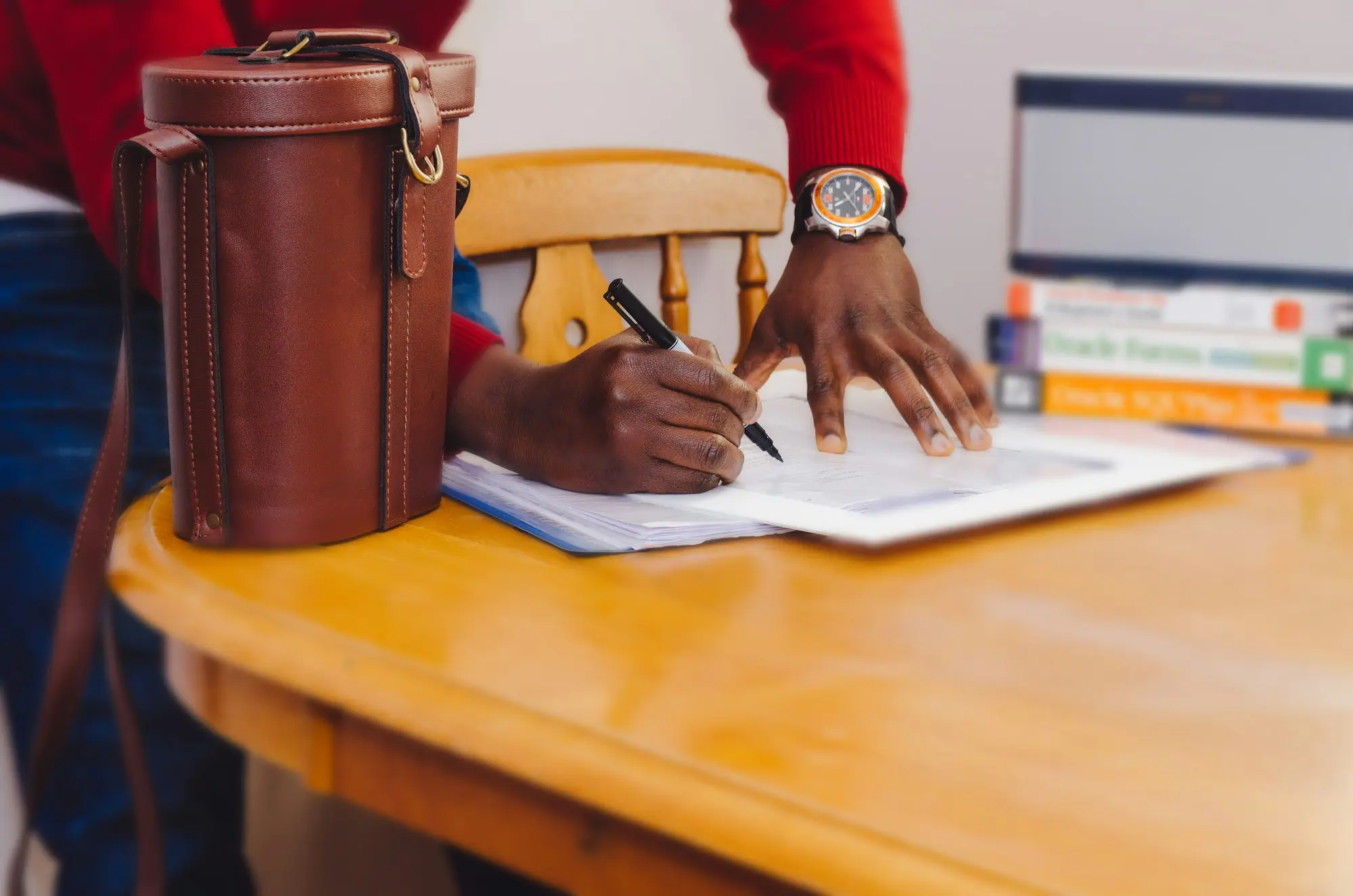 Owner checking loan documents desk